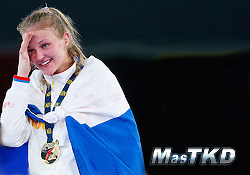 05 MAY 2012 - MANCHESTER, GBR - Anastasia Baryshnikova (RUS) of Russia celebrates her victory in the women's -73kg category final at the 2012 European Taekwondo Championships at Sportcity in Manchester, Great Britain (PHOTO (C) 2012 NIGEL FARROW)