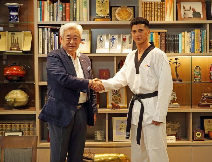 IOC Refugee Athlete Scholarship-holder Wael Fawaz Al-Farraj meets World Taekwondo President in Korea